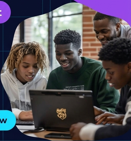 A group of students collaborating around a laptop